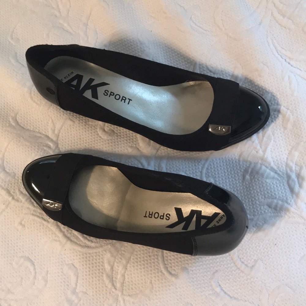 Ladies black wedge shoes.